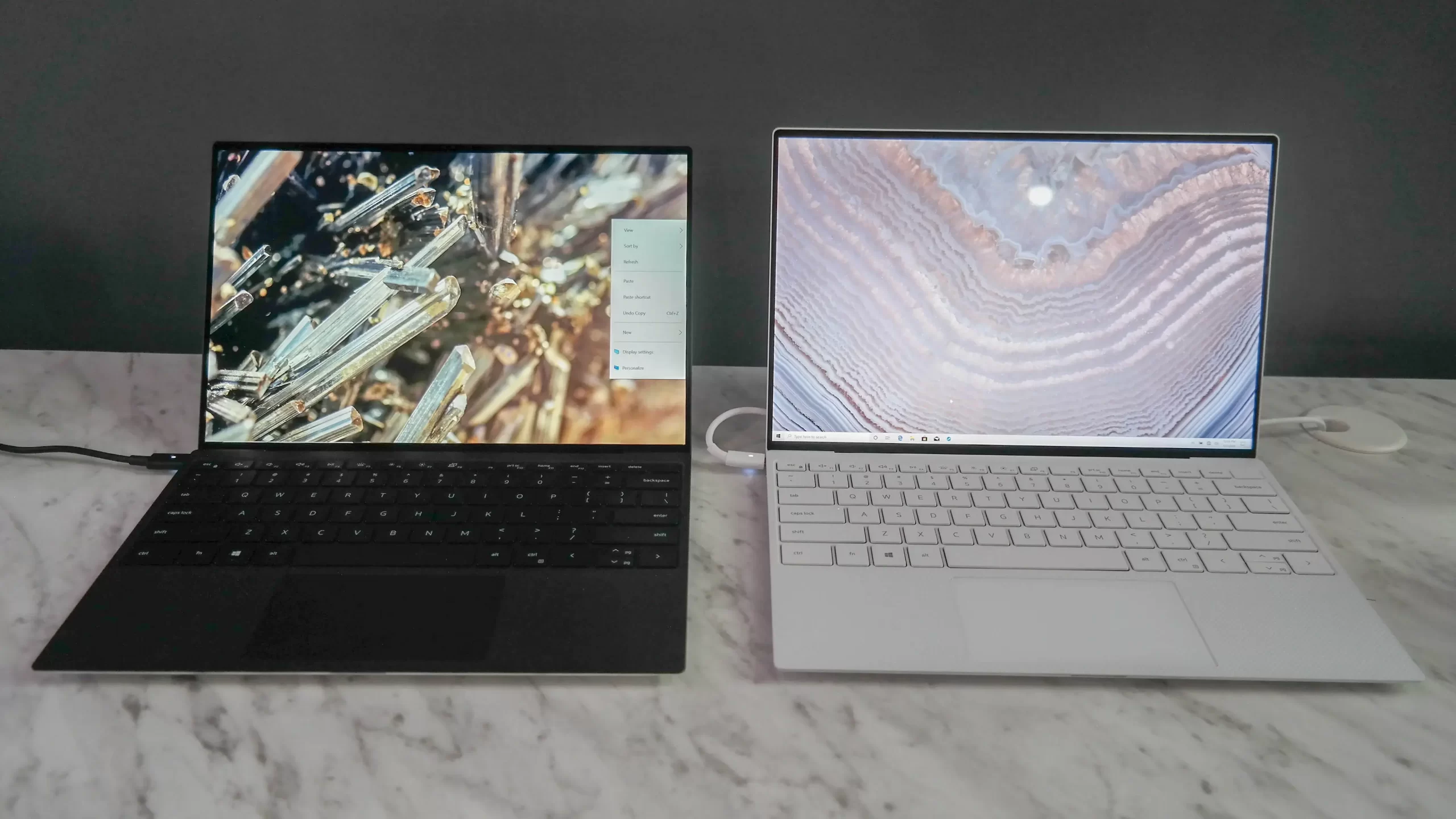 Ra mắt Dell XPS 13 9300 Model 2020 1. Thiết Kế Khác Biệt  Thay đổi lớn nhất của Dell XPS 13 9300 là màn hình, tỷ lệ màn hình 16:10, kích thước 13.4 inch khác so với các phiên bản trước. Tỷ lên này giúp mở rộng không gian hiển thị, giúp người dùng xem được nhiều nội dung hơn Có 2 option độ phân giải là FHD (1920 x 1200) pixel và UHD (3840 x 2400) pixel hỗ trợ khả năng hiện thị, độ sáng 500 nits Phần viên màn hình được thu gọn hơn đem lại cảm giác tràn viền hơn Kích thước Dell xps 13 9300 là 29,6cm x 19,9cm x 1,48cm nhỏ hơn tờ giấy A4.    2. Bàn phím Sự thay đổi tiếp theo đến từ Dell xps 13 9300 đó chính là phần bàn phím được làm rộng hơn và tràn ra 2 bên, khác hẳn với thiết kế trước đó, kích thước phím tăng lên, bàn di chuột cũng tăng lên, tạo cảm giác thoải mái khi sử dụng, hành trình phím chính xác, độ nảy nhất định, khiến cho việc đánh máy trở nên nhanh và chính xác hơn.    3. Cổng kết nối  Dell đã tối giản các cổng kết nối, chỉ để lại các cổng cần thiết và hữu dụng đem lại sự mỏng nhẹ cho máy, chỉ còn 2 cổng USB C ở 2 cạnh bên, khe đọc thẻ MicroSD và jack cắm tai ghe 3.5mm.  4.Hiệu Năng của Dell XPS 9300  Có nhiều cấu hình để người dùng lựa chọn, bộ vi xử lý core i3-1005G1, core i5 - 1035G1 và core i7-1065G7, với dung lượng ổ cứng 512gb và Ram 16gb. Dell XPS thế hệ mới cho thao tác nhanh gọn, hiệu năng mượt mà, sẽ là một chiếc máy đáng để sở hữu trong năm nay    5. Thời lượng pin  Dell báo cáo rằng thời lượng của model 2020 này lên đến 10h, giúp bạn làm việc cả một ngày mà không phải ko lắng về sạc. Kết luận: Với thiết kế mỏng nhẹ hơn, tinh tế hơn, Dell Xps 13 9300 model 2020 là bước đột phá mới, phá bỏ giới hạn của các phiên bản tiền nhiệm. Hãy đến Gia Nguyễn và trải nghiệm sự mới mẻ này!
